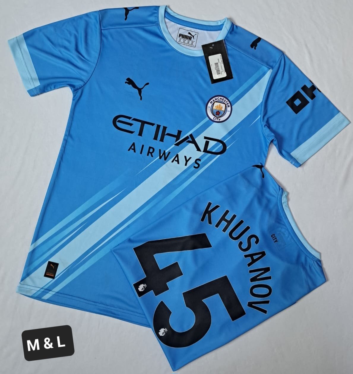 MANCHESTER CITY KHUSSANOV 42 SKY BLUE T SHIRT